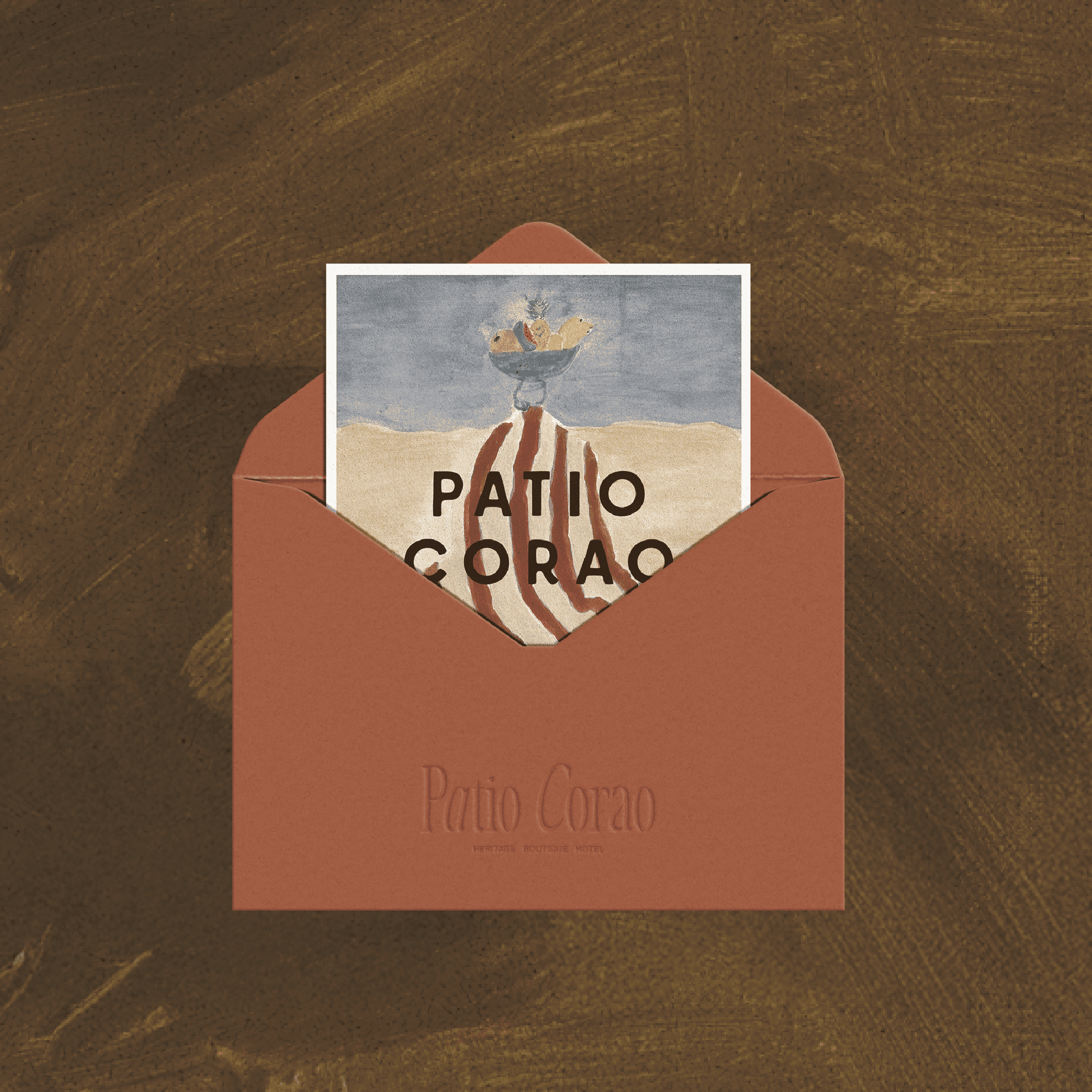 Artistic postcard featuring a fruit bowl illustration and the Patio Corao logo.