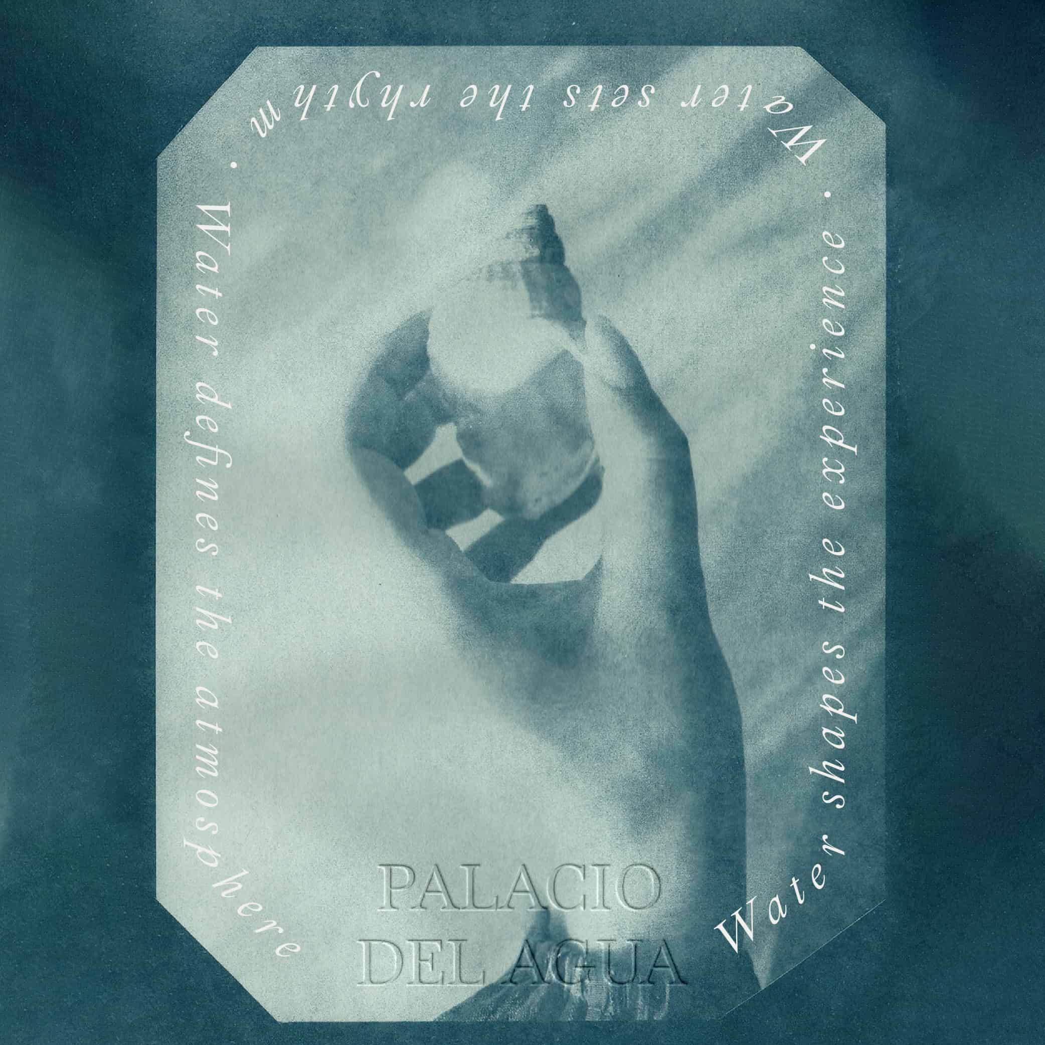 Hand holding a water bottle with Palacio del Agua text.